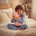 Ourson en peluche marron de 25 cm de la marque Petit-Ours, doux et câlin, posé sur un fond neutre.